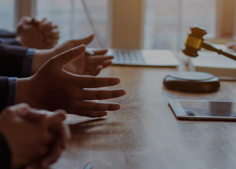 A group of people sitting around the table