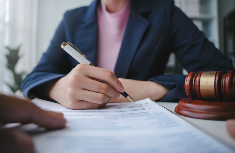 Lawyer is signing documents