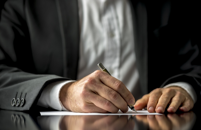 lawyer working through document