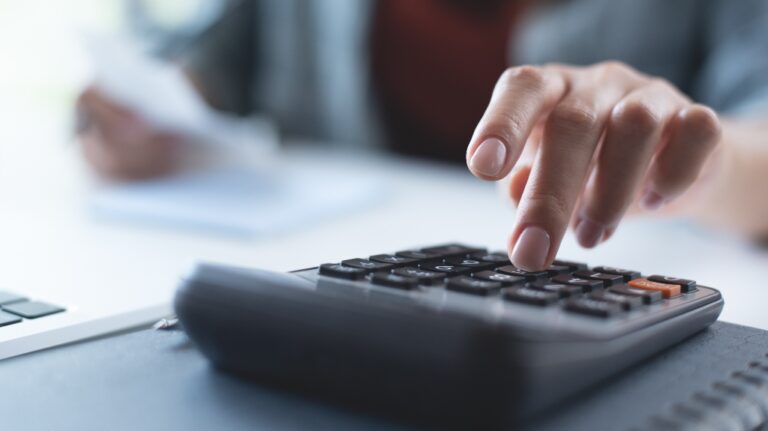 woman is calculating taxes