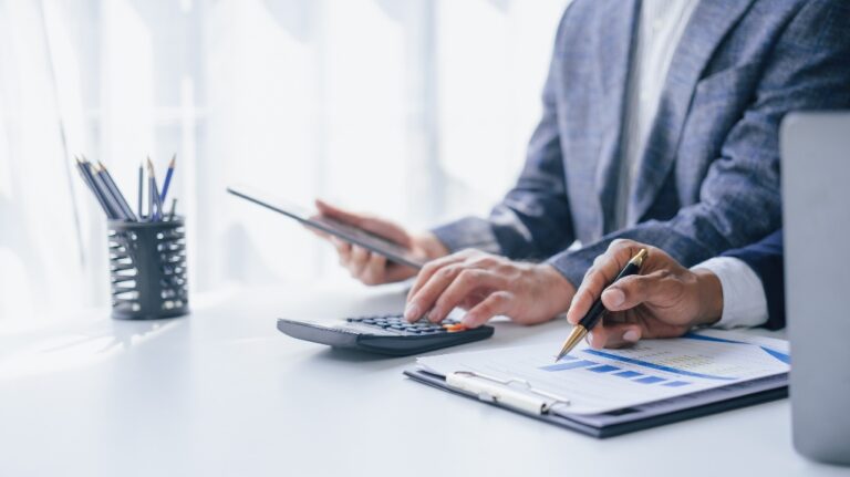 Lawyer with client are reviewing documents