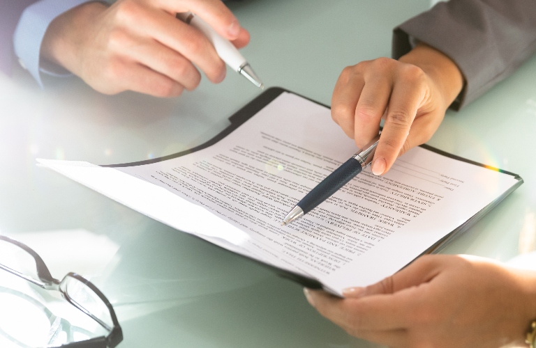 lawyer is showing documents to the client