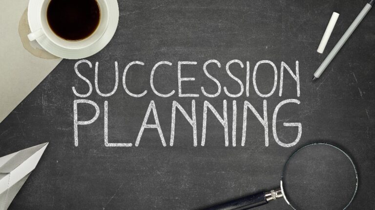 Succession planning is written on blackboard