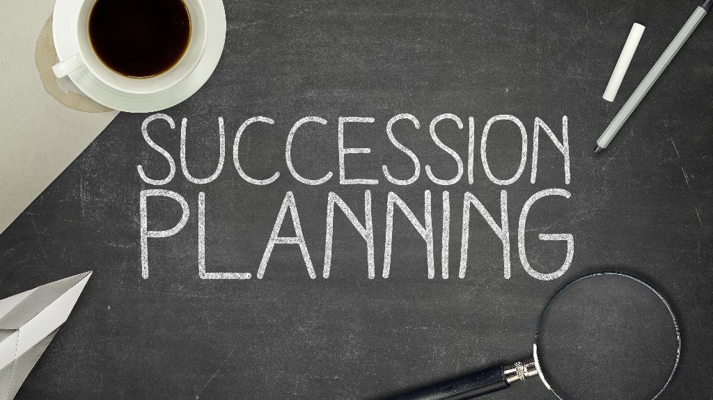 Succession planning is written on blackboard