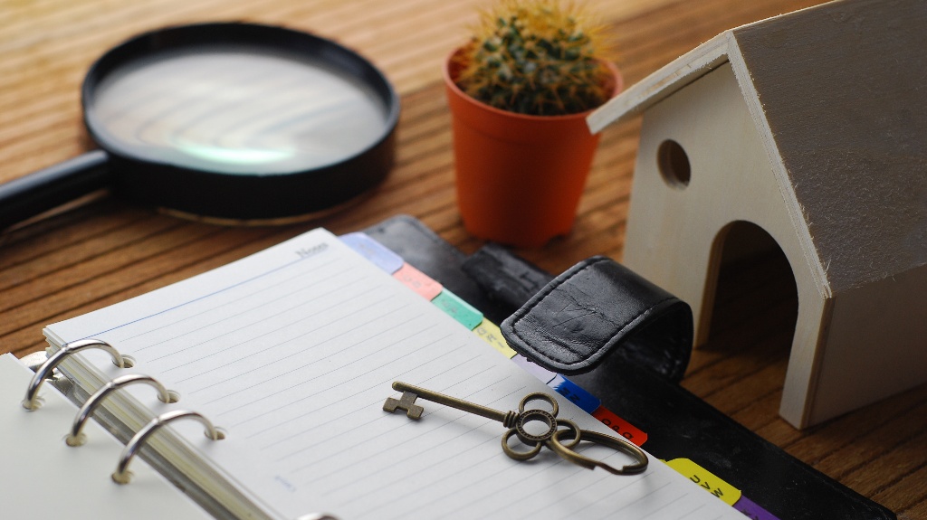 Wooden house model and keys