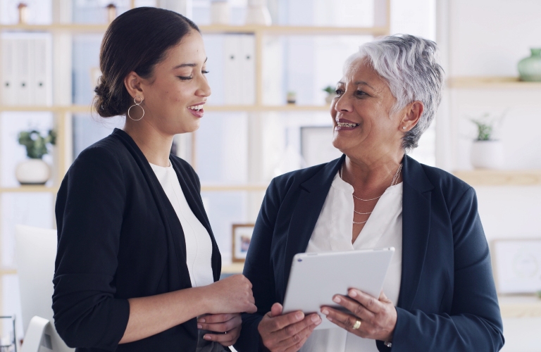 Financial advisor, consulting and tablet with old woman